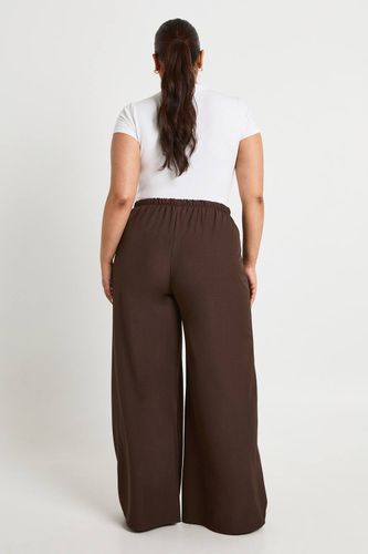 Pantalon ample tissé à taille élastiquée avec cordon de serrage et jambes larges | Taille 48 - boohoo - Modalova
