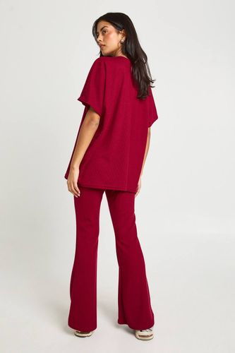 Legging côtelé bicolore évasé & haut coordonné | Taille 38 - boohoo - Modalova