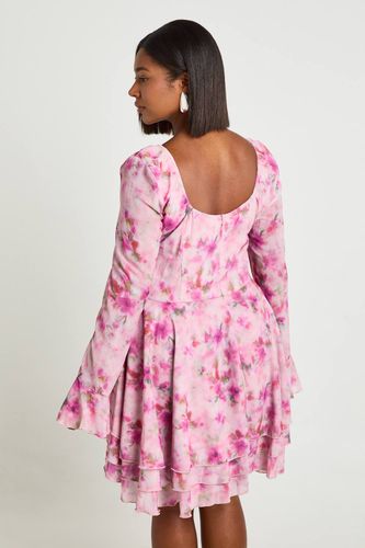 Robe Patineuse En Mousseline À Imprimé Floral Grande Taille | Taille 48 - boohoo - Modalova