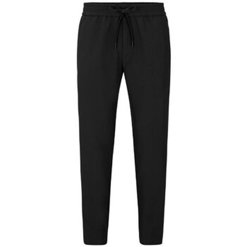 Pantalon CHINO T-FLEX TAPERED FIT EN TISSU STRETCH DÉPERLANT NOI - BOSS - Modalova