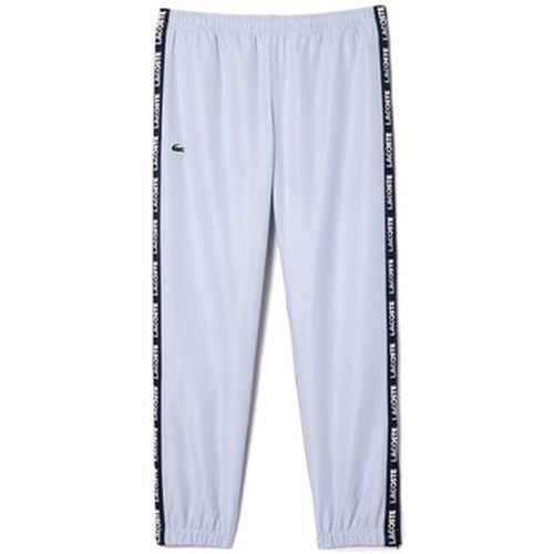 Pantalon PANTALON DE SURVÊTEMENT TENNIS SPORTSUIT DOUBLÉ - Lacoste - Modalova