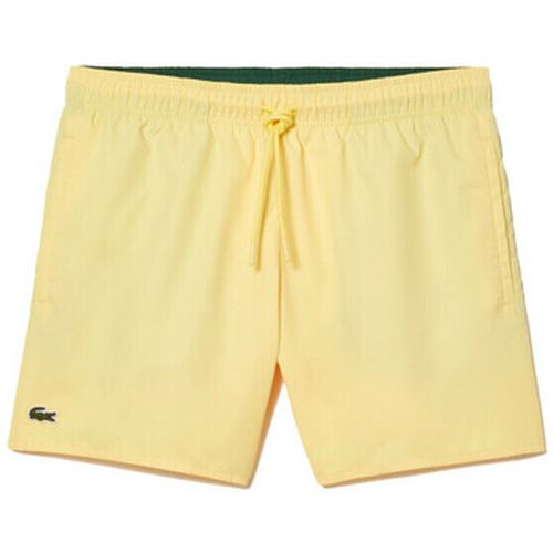 Maillots de bain SHORT DE BAIN LÉGER UNI À SÉCHAGE RAPIDE - Lacoste - Modalova