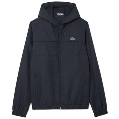 Manteau VESTE DE SURVÊTEMENT DÉPERLANTE SPORT FONCE - Lacoste - Modalova