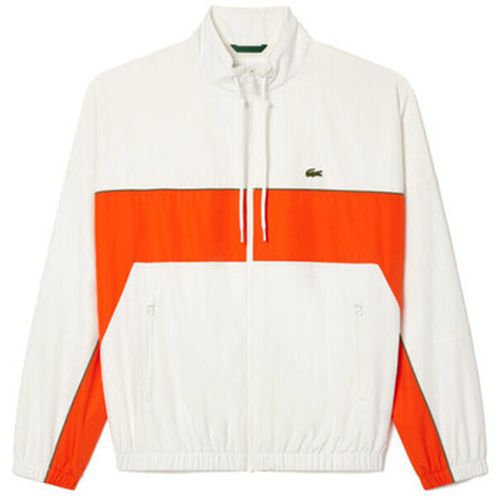 Sweat-shirt VESTE SPORTSUIT COURTE DÉPERLANTE BLANCHE ET ORANGE - Lacoste - Modalova