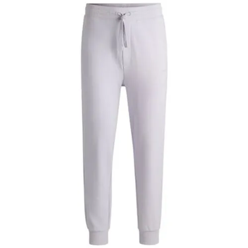 Pantalon PANTALON DE SURVÊTEMENT EN COTON ÉPONGE LILAS AVEC LOGO - BOSS - Modalova