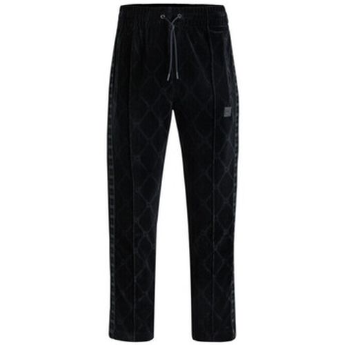 Pantalon PANTALON DE SURVÊTEMENT À OURLET ZIPPÉ RELAXED FIT - BOSS - Modalova