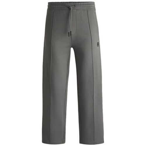 Pantalon BAS DE SURVÊTEMENT EN MOLLETON DE COTON AVEC BANDES LOG - BOSS - Modalova