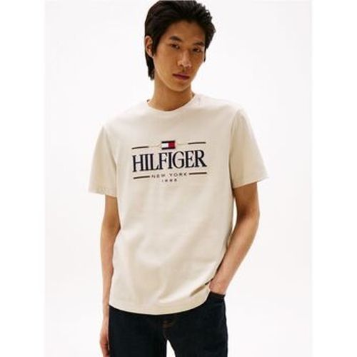 T-shirt MW0MW39585 ICON-ACG NEWSPINT - Tommy Hilfiger - Modalova