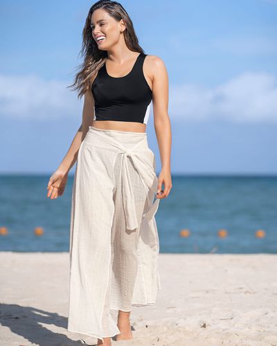 Pantalon de plage de Gaza anudable sur le devant en coton biologique et rayonne - Leonisa - Modalova