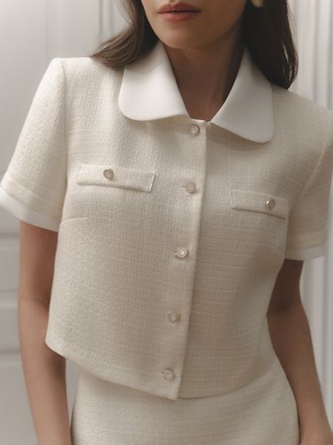 Short-sleeved tweed top with contrasting inserts - Lichi - Modalova