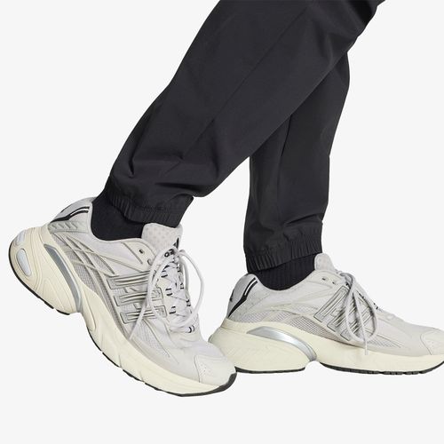 Pantalons adidas Tech Trefoil Essentials Track Pant S - adidas Originals - Modalova